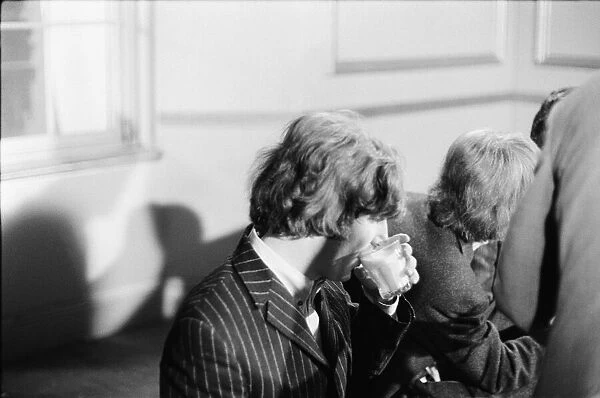 Picture shows John Lennon drinking a glass of milk. The Beatles hold a news