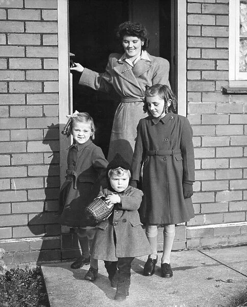 Picture shows Mrs Edna Ford with her children, leave their house in Knowle Park, Bristol