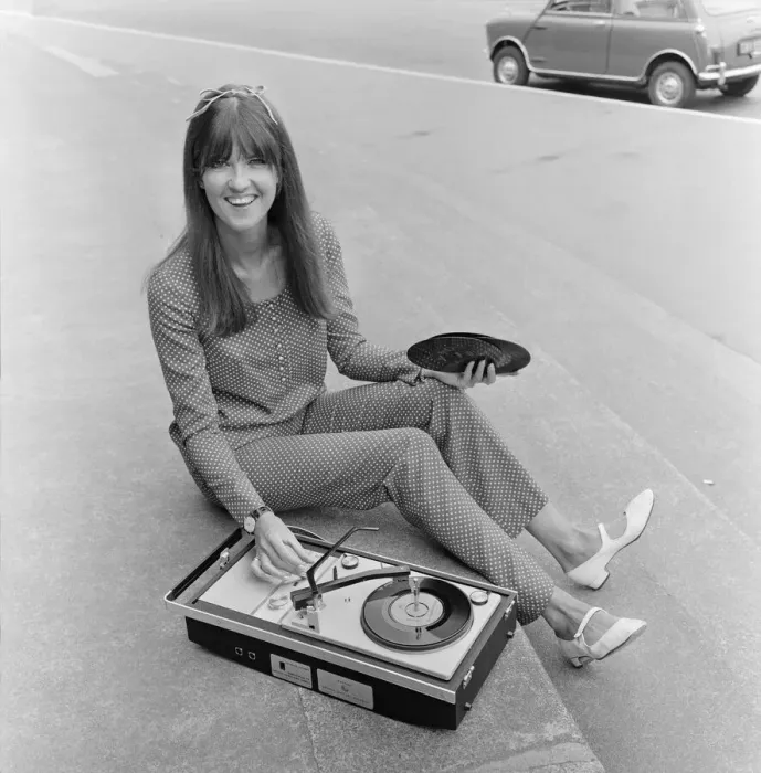 Framed Print : Picture shows The Ready Steady Go TV pop show presenter Cathy McGowan holding a Framed Print : Picture shows The Ready Steady Go TV pop show presenter Cathy McGowan holding a