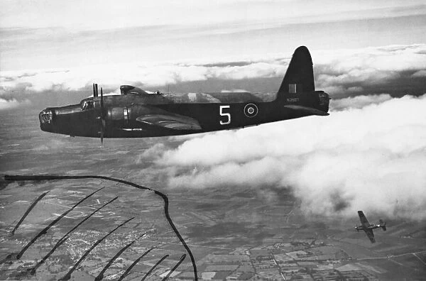 Picture shows a Wellington aeroplane, (number N2887 on the tail wing
