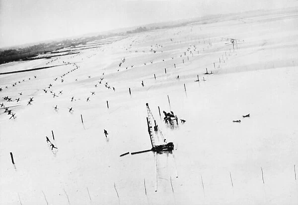 Picture taken from Allied fighter, shows German troops running for cover as plane swoops