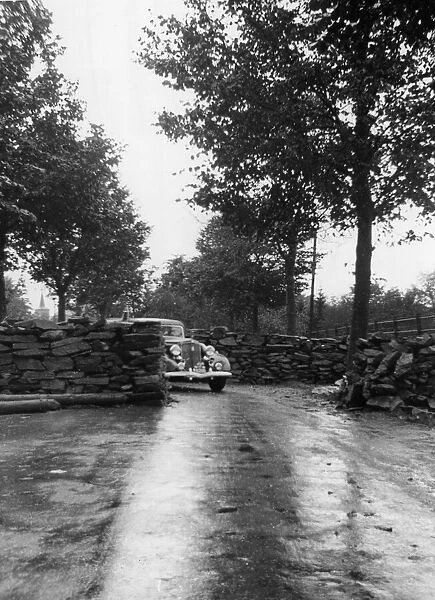 Picture taken on the roads near the Belgium - Luxembourg border showing barricades with