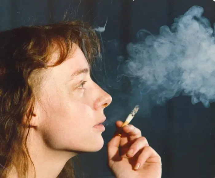 Framed Print : A picture of a woman (Posed model) smoking Framed Print : A picture of a woman (Posed model) smoking