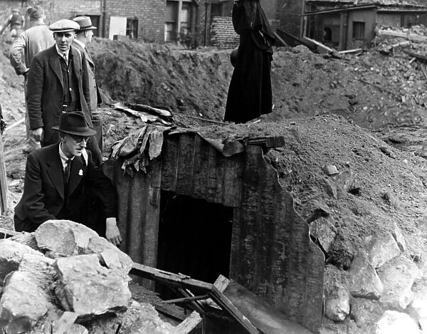 Pictured is the Anderson shelter which saved four people when a bomb made the crater in