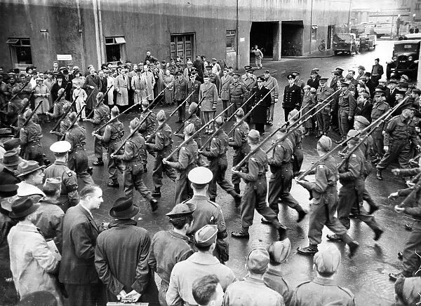 Pictured, the march past of British Troops seen after the arrival in Iceland of American
