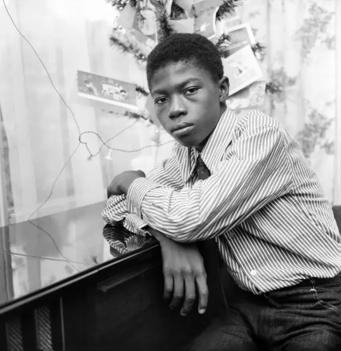 Framed Print : Pictured at his sisters home in Ilford, 13 year old Ebenezer Baidoo waiting by