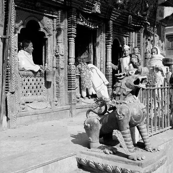 Pilgrims at a buddhist temple belived to be Changnarayan, in Katmandu, Nepal l l