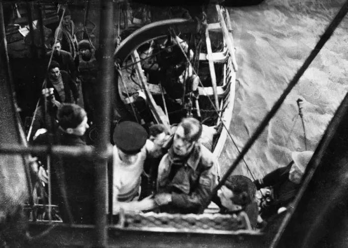 Framed Print : The pilot of a German Heinkel Bomber plane of the Luftwaffe is brought aboard a British Framed Print : The pilot of a German Heinkel Bomber plane of the Luftwaffe is brought aboard a British