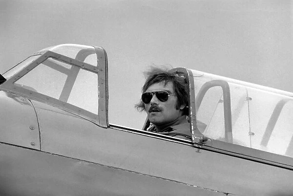 A pilot in his plane on the runway at Biggin Hill during the airshow. May 1975