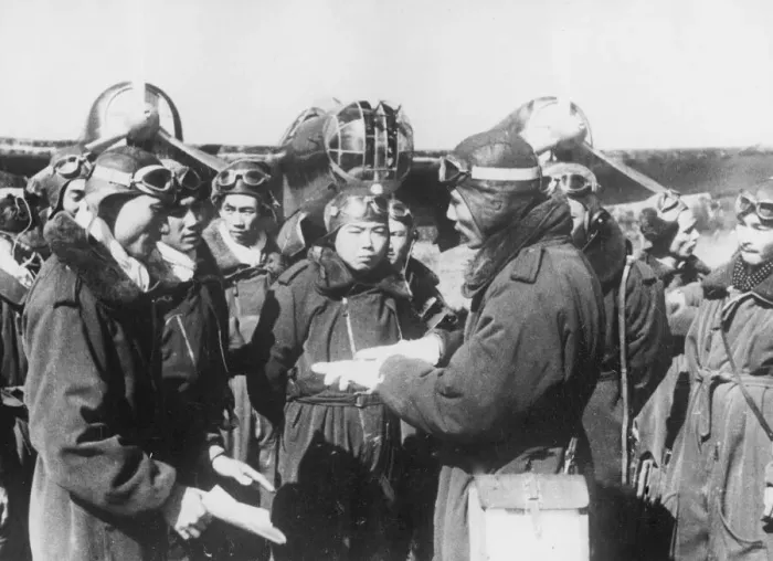 Framed Print : Pilots of the Chinese Air Force receive instructions from officers before taking off for Framed Print : Pilots of the Chinese Air Force receive instructions from officers before taking off for