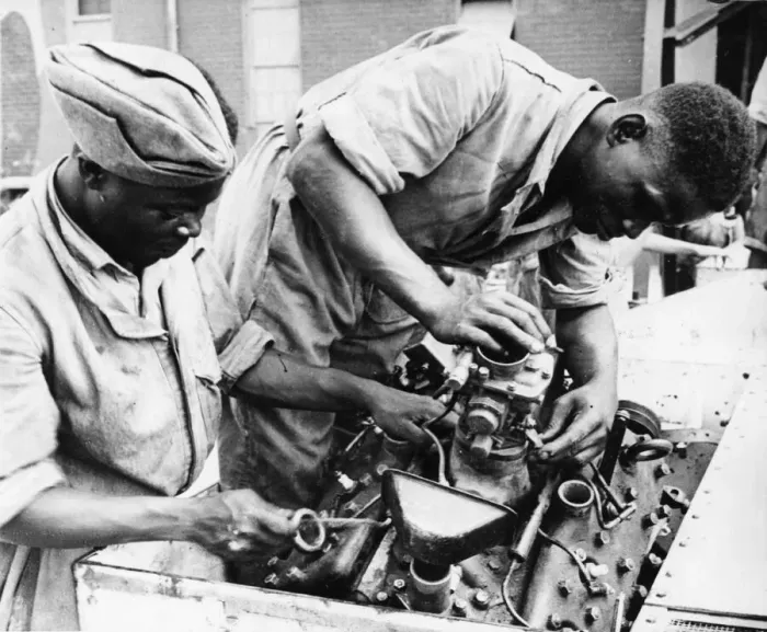 Framed Print : The Pioneer Corps (East African Division) making adjustments to a Bren Gun Carrier Framed Print : The Pioneer Corps (East African Division) making adjustments to a Bren Gun Carrier