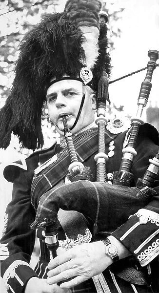 Pipe Major George Anderson, of Morpeth Pipe Band, gets himself tune up in June 1972