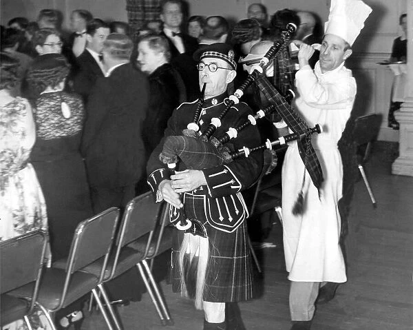 Pipe Major J. C. Mason piping in the haggis for the Newcastle