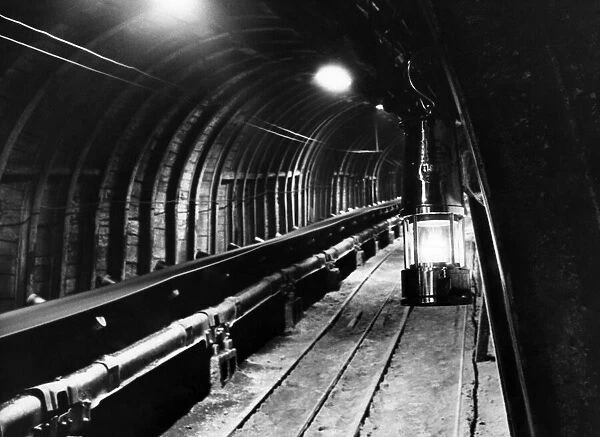 Pit tunnel showing conveyer belt and a Davey lamp at a coal mine in Newstead