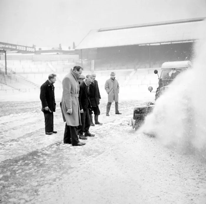 Framed Print : Pitch Inspection. Birmingham grounds staff seen here clearing snow from the pitch Framed Print : Pitch Inspection. Birmingham grounds staff seen here clearing snow from the pitch