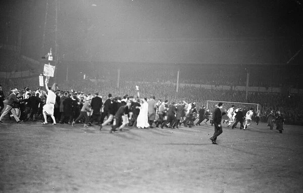 A pitch invasion after the Tottenham Hotspur v Gornik Zabrze European Cup tie played at