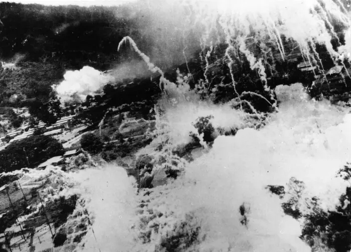 Framed Print : US planes drop phosphorous bombs over a Japanese radio station at Rabaul