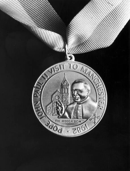 Platinum medal showing Manchesters Hidden Gem Church
