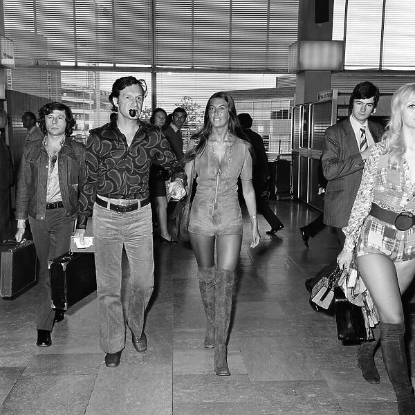 Playboy boss Hugh Hefner pictured at Heathrow Airport before his flight to Saint-Tropez