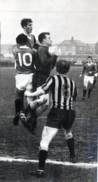 Framed Print : Player manager Jock Wallace clears from mclean and forrest at Berwick circa 1965