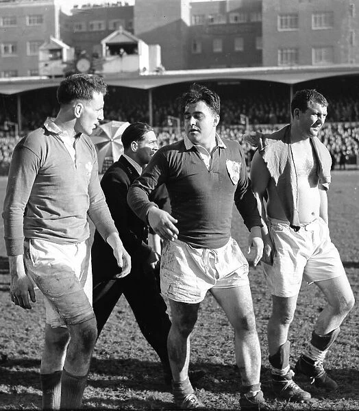 Players walk off the pitch at the end of the Wales v France five nation championship