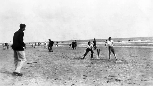 Playing cricket on the beach at Hayling Island, Hampshire. August 1929