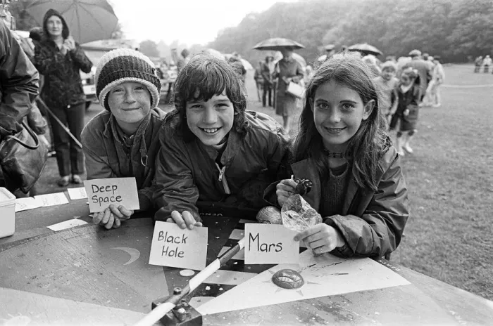 Framed Print : Playing the planet game'at a rain soaked Brighouse Fun Day were (from left Framed Print : Playing the planet game'at a rain soaked Brighouse Fun Day were (from left