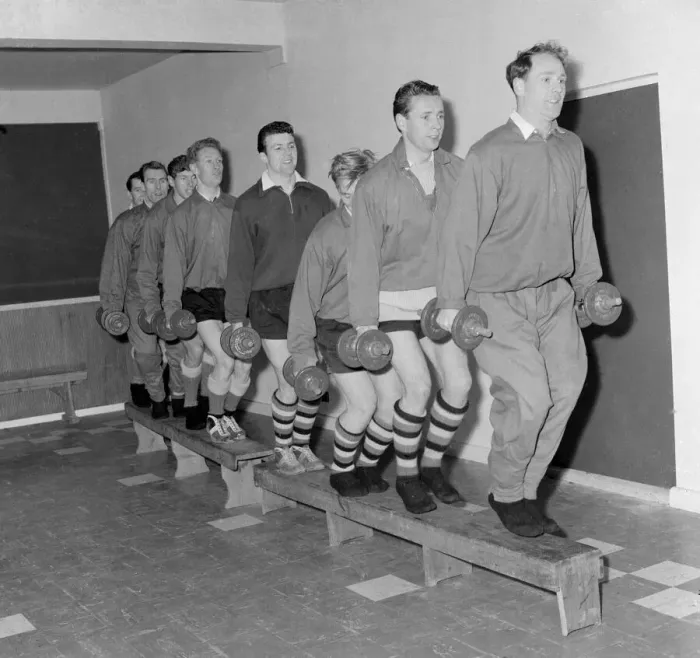 Framed Print : Plymouth Argyle football team carrying weights as they take part in training exercises Framed Print : Plymouth Argyle football team carrying weights as they take part in training exercises