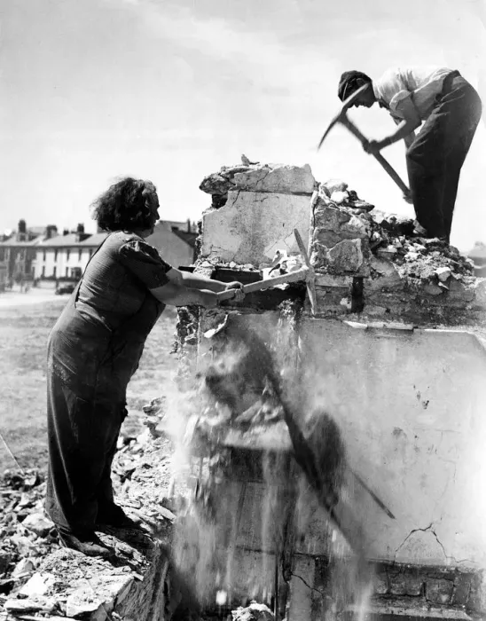 Framed Print : Plymouths squad of professional women navvies hard at work with the men pulling down
