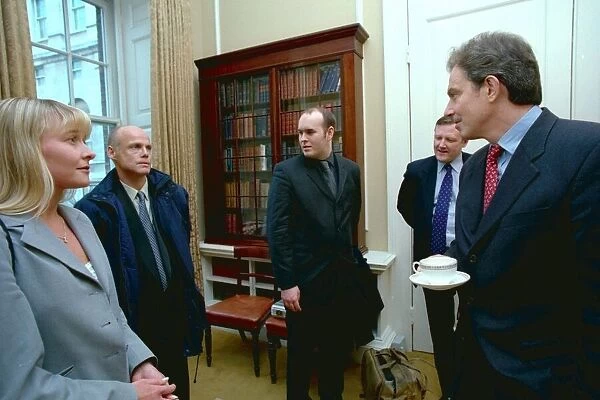 PM Tony Blair chats with Scott Armstrong, Jackie Hall and David Young during their visit