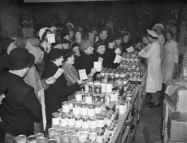 The points'rationing for canned foods started to-day. 1st December 1941