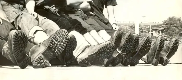 Framed Print : Police cadets sitting down after a charity plod round the boundaries of Northumberland