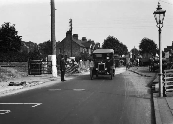 Framed Print : Police direct traffic as workmen repair the road in an unknown location in Uxbridge Framed Print : Police direct traffic as workmen repair the road in an unknown location in Uxbridge