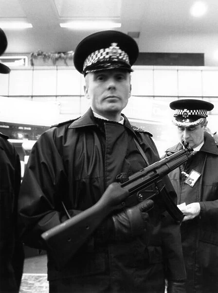 Police with machine guns at Heathrow airport. January 1986