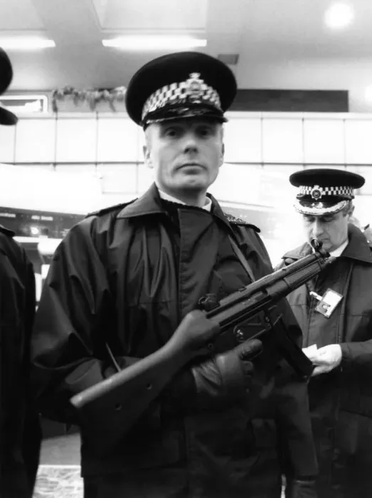 Framed Print : Police with machine guns at Heathrow airport. January 1986 Framed Print : Police with machine guns at Heathrow airport. January 1986