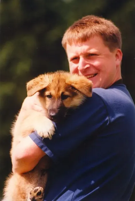 Framed Print : Police Officer Paul Dover with puppy Asa Framed Print : Police Officer Paul Dover with puppy Asa