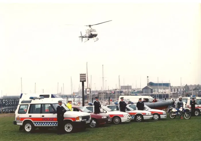 Framed Print : Police officers in their varied forms of transport - cars