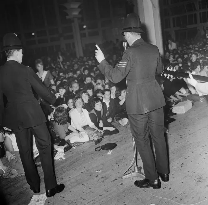 Framed Print : Police on stage before Beatles concert at the Pavillion Dance Hall in Buxton Framed Print : Police on stage before Beatles concert at the Pavillion Dance Hall in Buxton