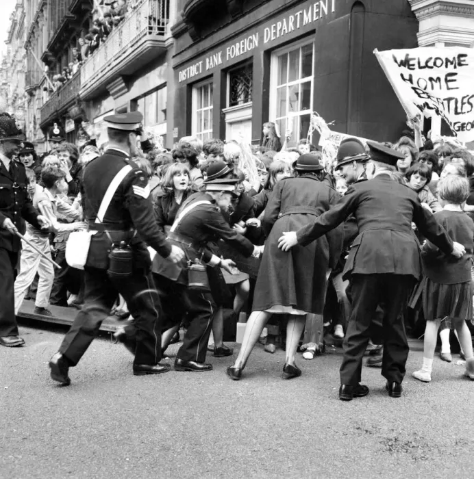 Framed Print : Police try to control fans in the streets of Liverpool before the premiere of the Beatles