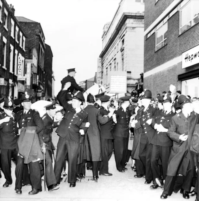 Framed Print : Police try to control fans in the streets of Liverpool before the premiere of the Beatles