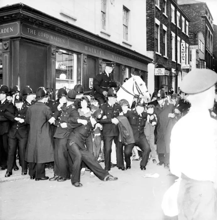 Framed Print : Police try to control fans in the streets of Liverpool before the premiere of the Beatles