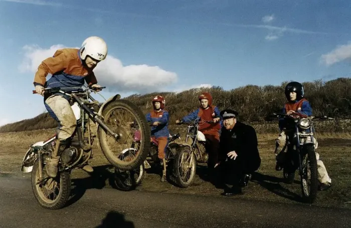 Framed Print : Policeman Ewan Skinner with some of the kids on the Rural