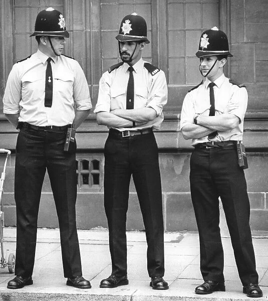 Three policemen on duty outside the Council House, Coventry. 23rd June 1988