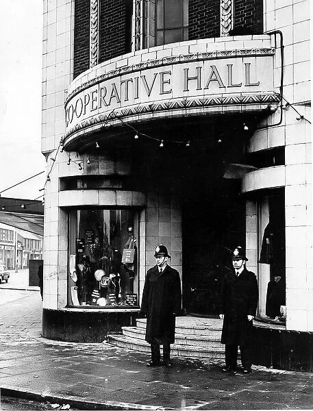 Policemen on guard outside the Co-operative Hall, Nuneaton. January 1st 1966