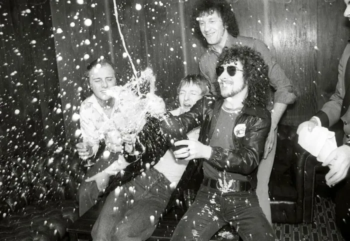Framed Print : Pop band Black Lace enjoy a bottle of champagne after victory in the Eurovison song Framed Print : Pop band Black Lace enjoy a bottle of champagne after victory in the Eurovison song