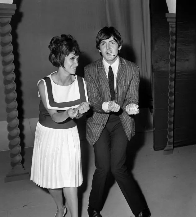 Framed Print : Pop Group The Beatles July 1964. Paul McCartney with singer Chita River during Framed Print : Pop Group The Beatles July 1964. Paul McCartney with singer Chita River during