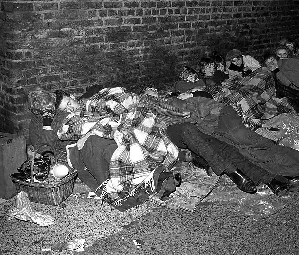 Pop Group The Beatles November 1963 Night shots of fans a sleep queuing at
