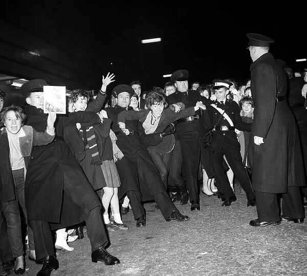 Pop Group The Beatles November 1963 Police hold back fans