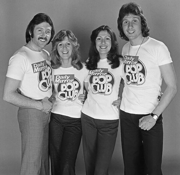 Pop group Brotherhood of Man model Daily Mirror Pop Club T-Shirts. 23rd April 1976