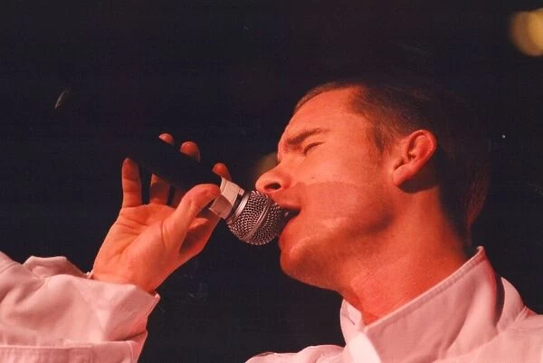 Pop group East 17 perform in concert at the Whitley Bay Ice Rink 27 June 1995 - Tony
